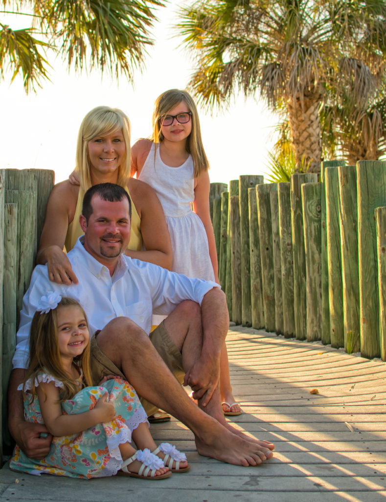 clearwater-beach-photographer-portrait-of-family-with-two-kids-789x1024.jpg